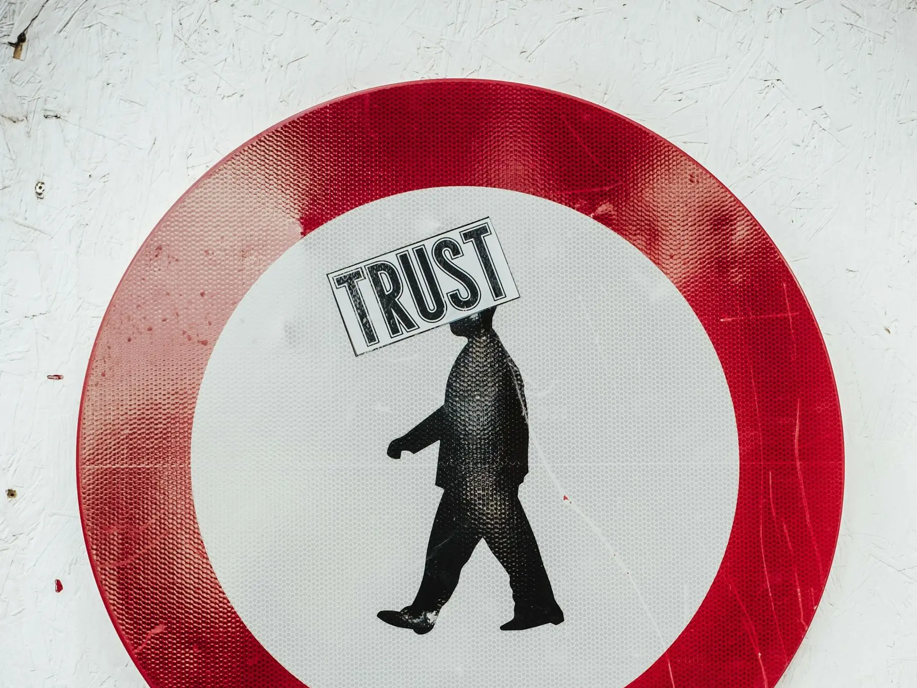 round red and white Trust signage